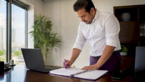 Entrepreneur reviewing GSA contract documents