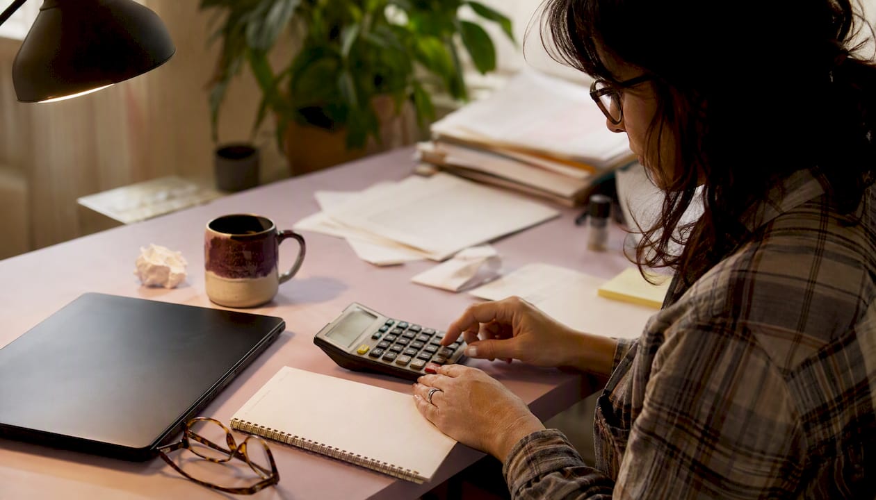 Business owner calculating eligibility
