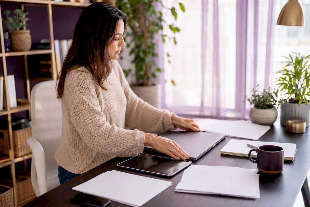 Hands organizing digital files for GSA contract