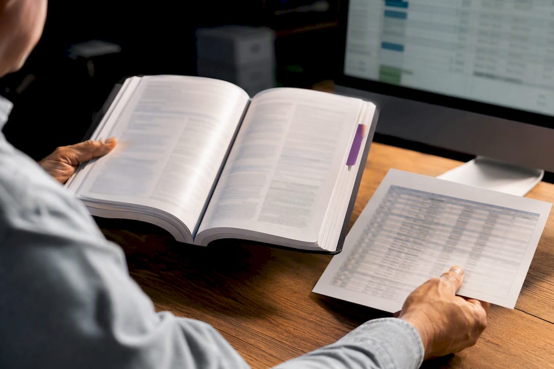 Contractor reviewing PSC reference materials